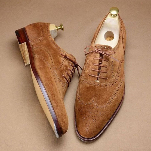 Brown brogue point-toe suede dress shoes