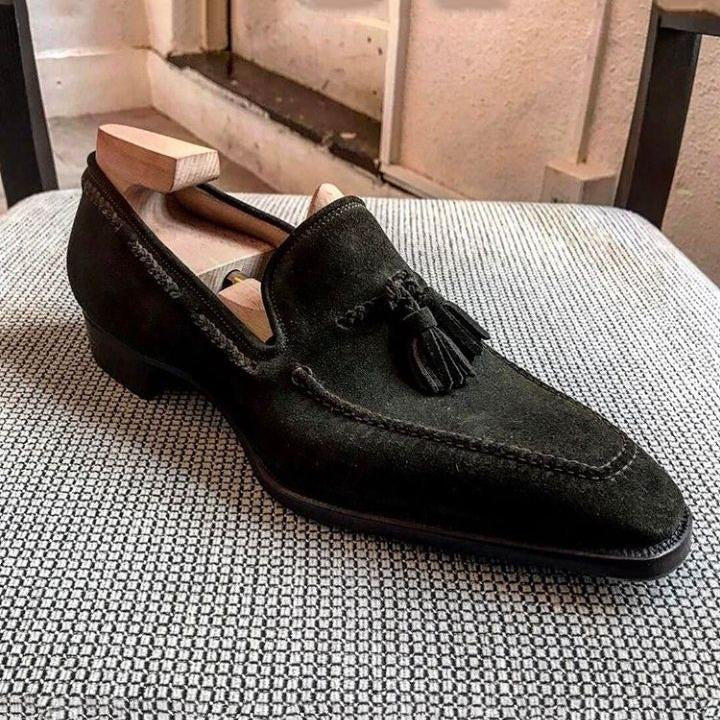 Dark black fringed men's dress shoes